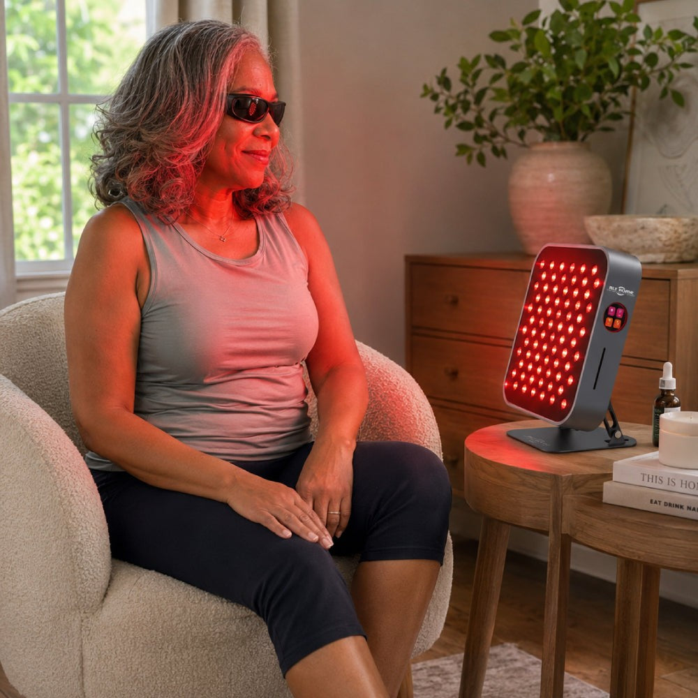 RLT Home Total Spectrum MINI on a side table during a seated session