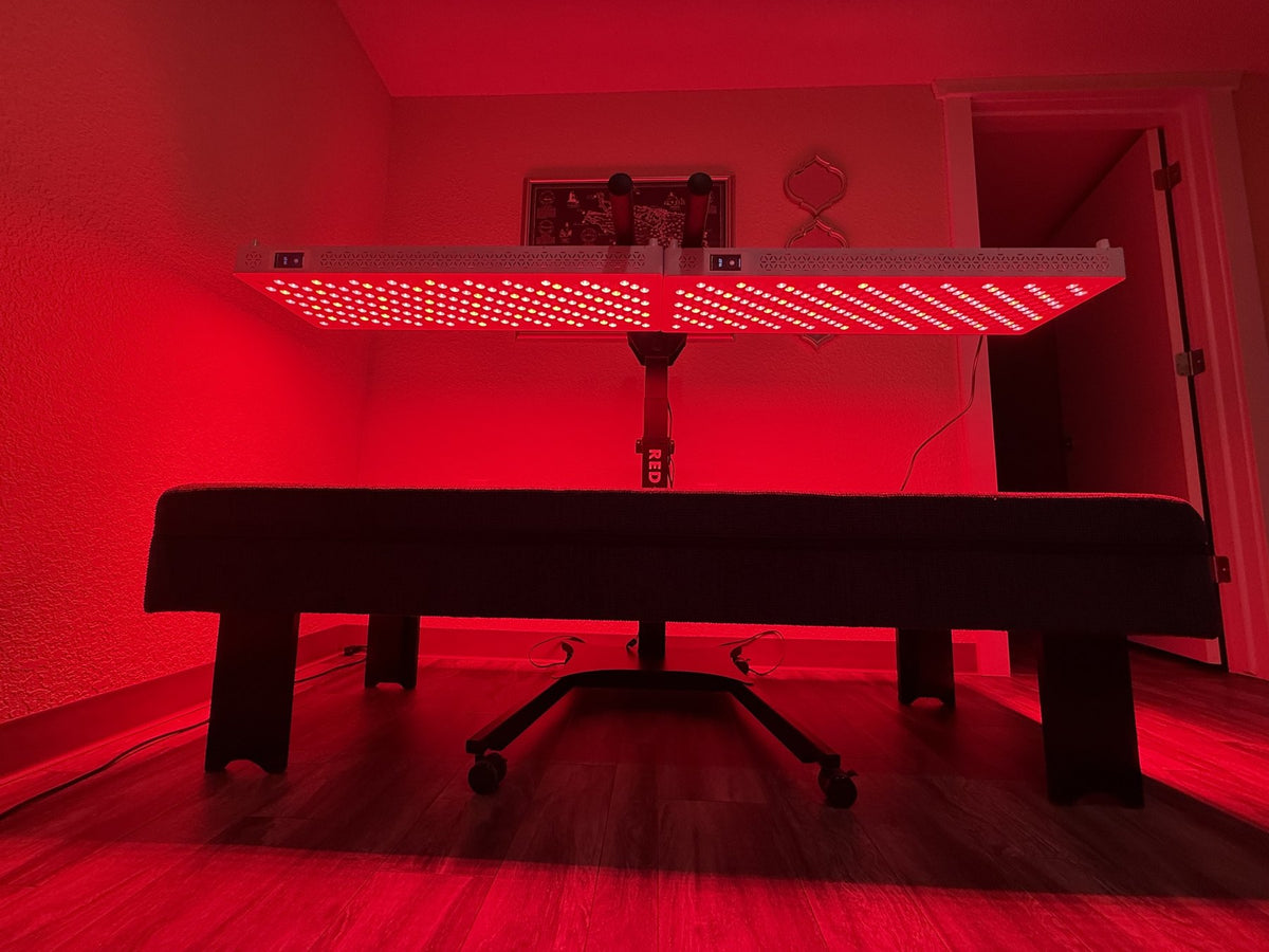 Red Nova customer photo, two panels on an overhead stand above a bench